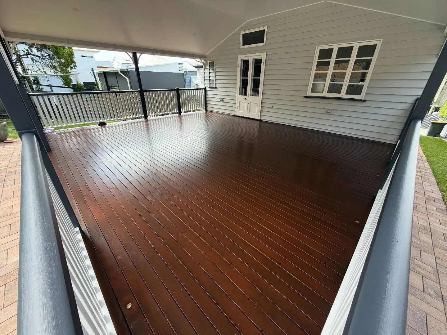 Verandah deck and weatherboard walls, photo 1