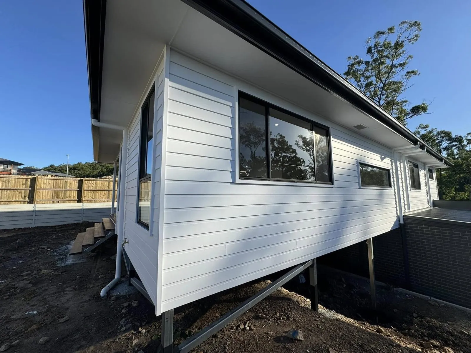 New build, inside and out, Spring Mountain, photo 1