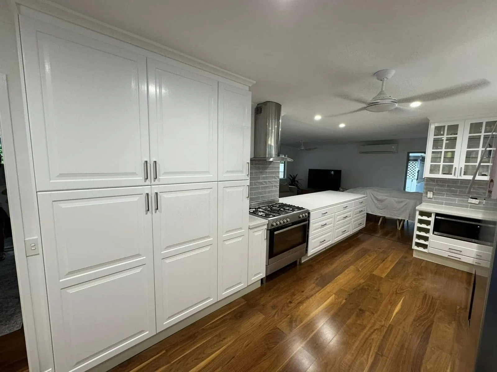 After: Kitchen cabinets repainted white
