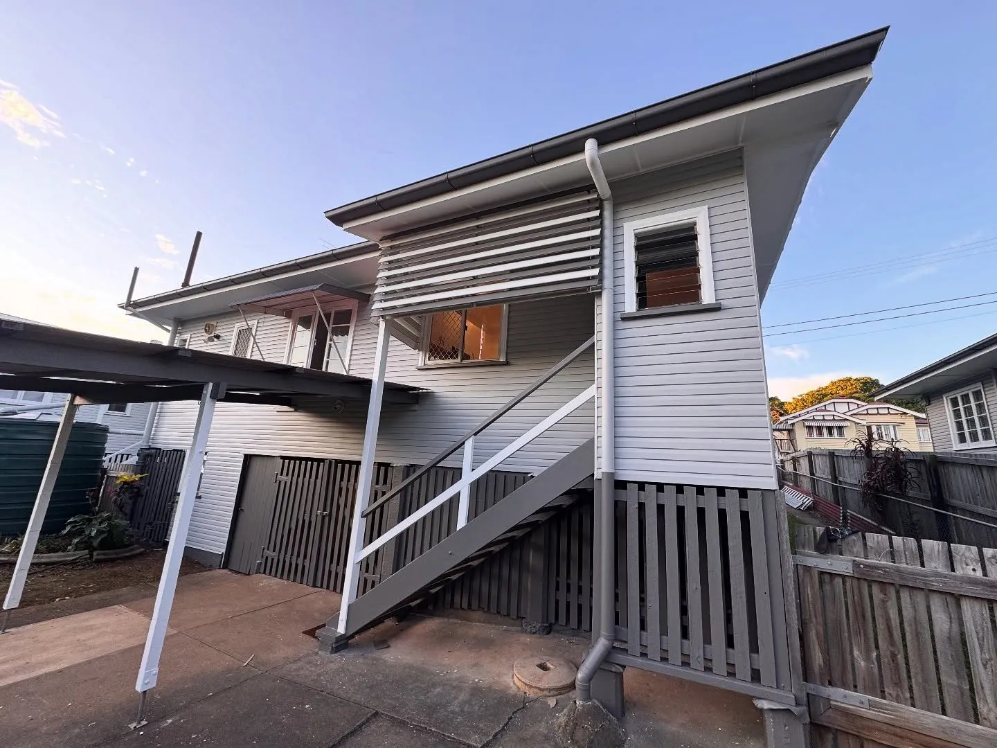 After: Post-war weatherboard exterior restoration, Annerley