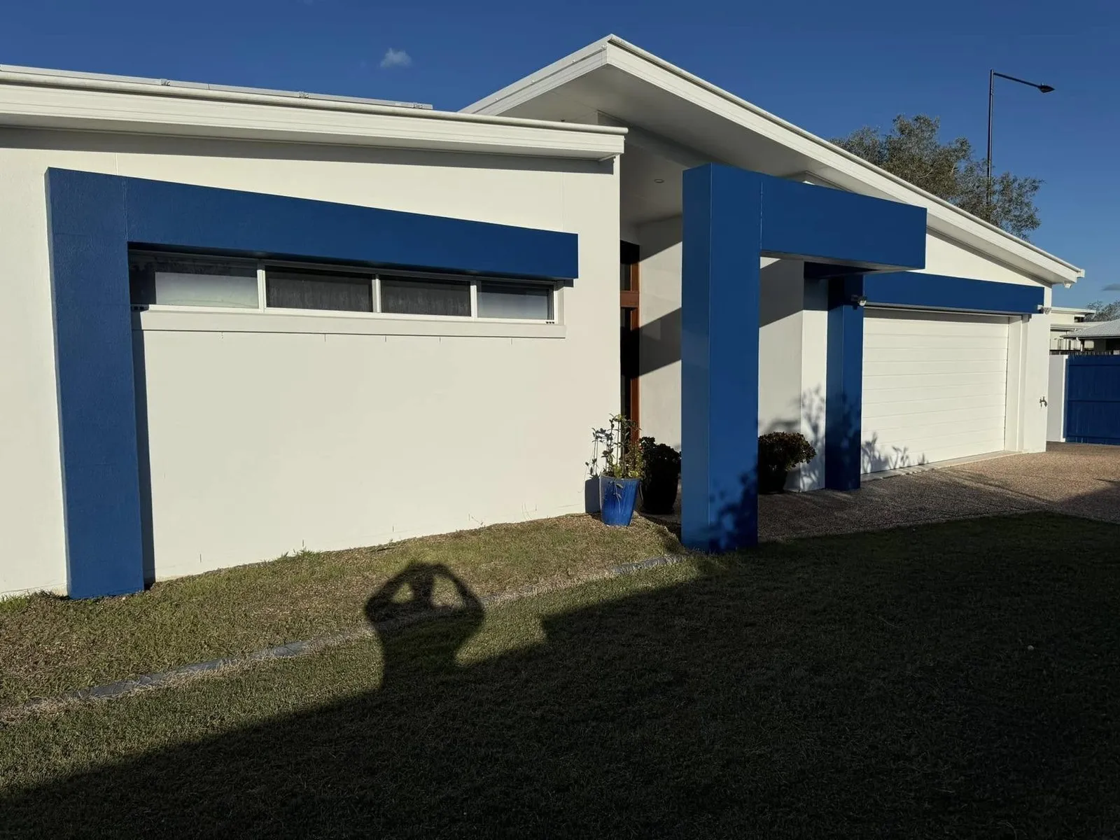 Rendered exterior and blue fence