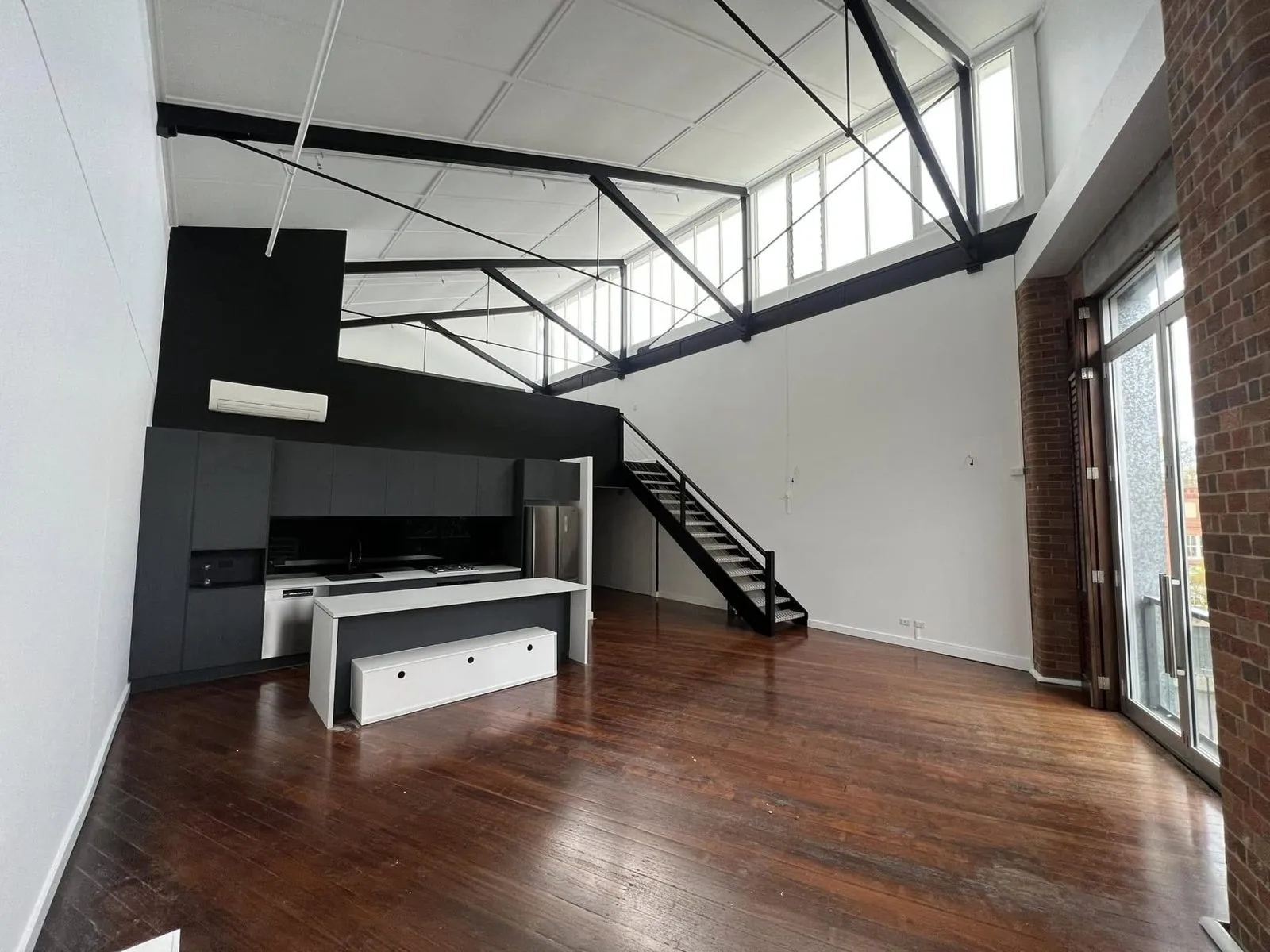 Heritage warehouse apartment with 6m ceilings
