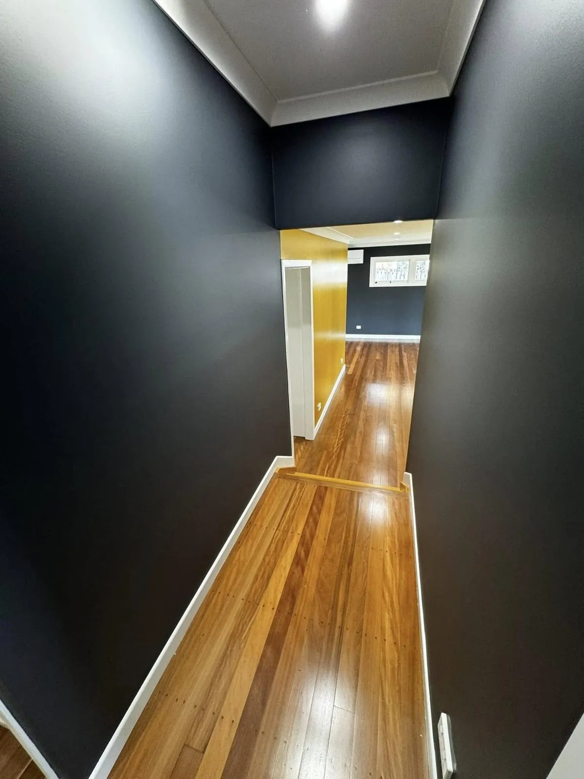 Renovation with dark and gold feature walls, photo 8