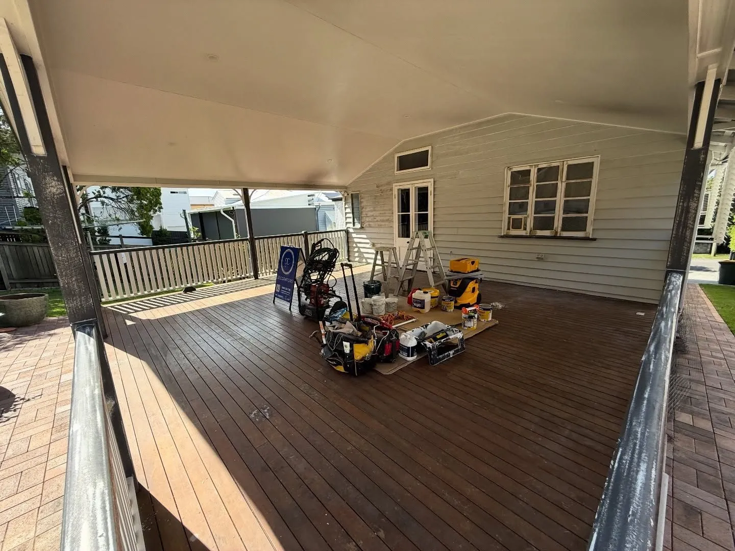 Before: Verandah deck and weatherboard walls