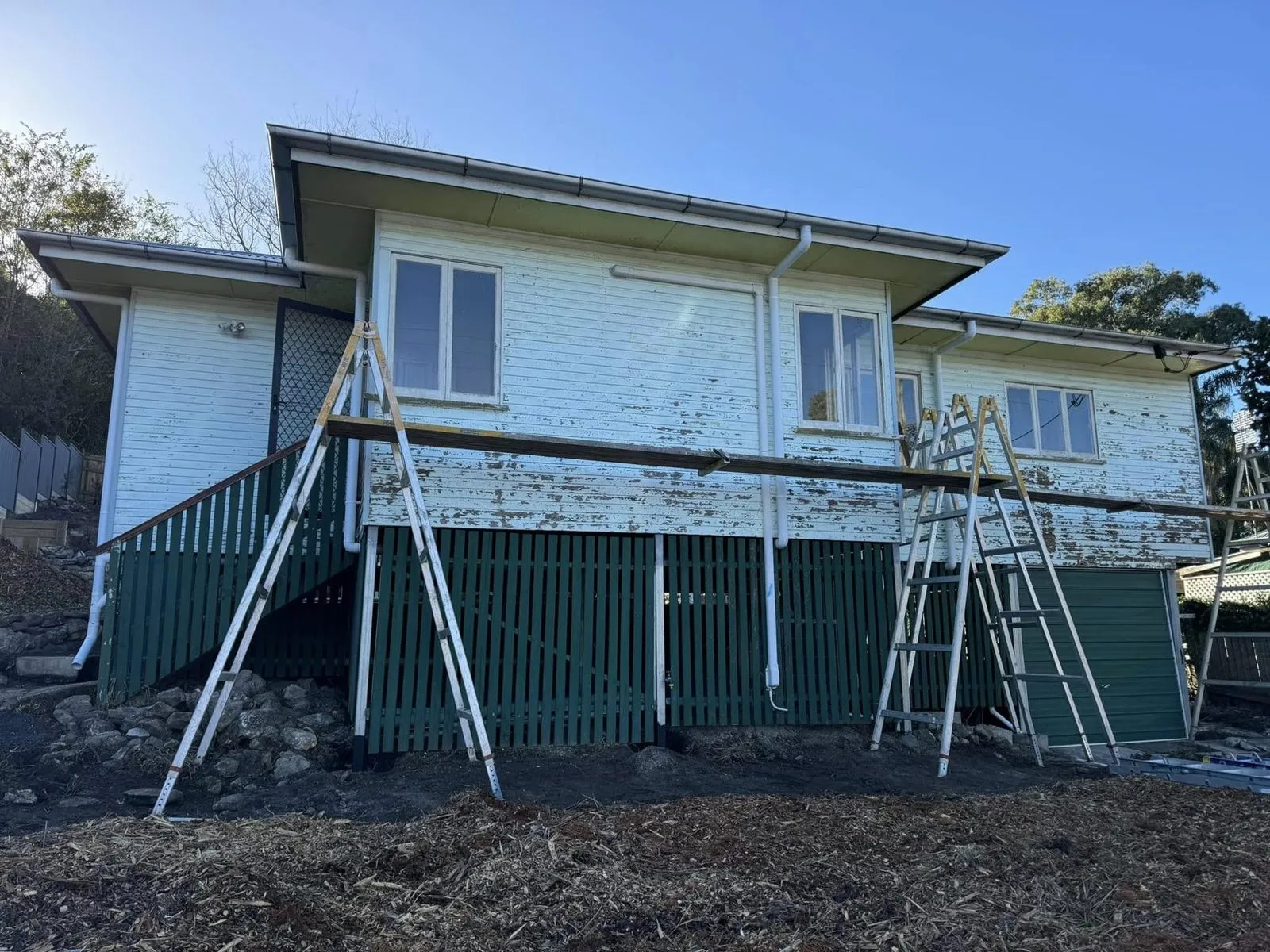 Before: Weatherboard house exterior